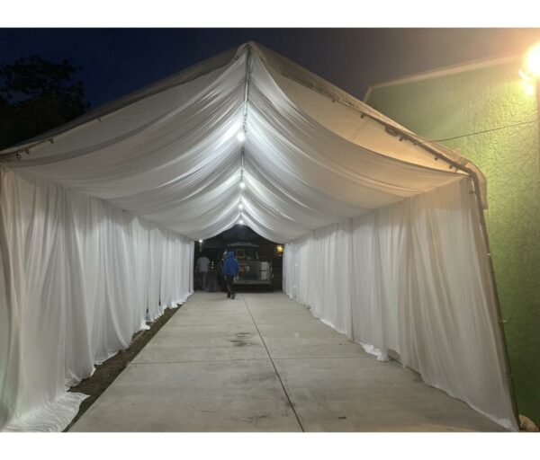 Canopy 10' x 20' and drapes for $570 (Labor included at price)